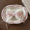 A sweet and girlish high ponytail hairpin with floral prints and a fresh pinkish-green flower bow with lace trim Item Picture